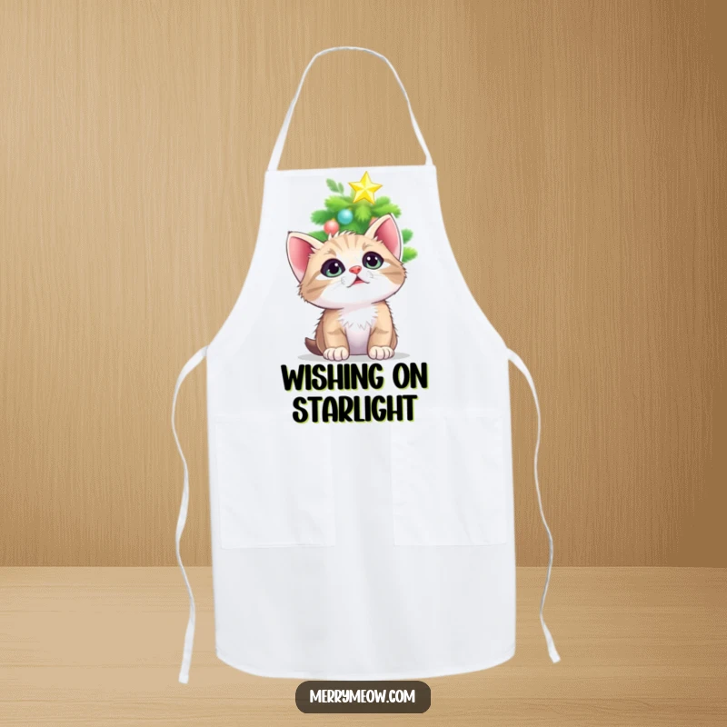 Funny apron featuring a kitten looking up with adoration at a twinkling Christmas tree star, ideal for festive cooking.