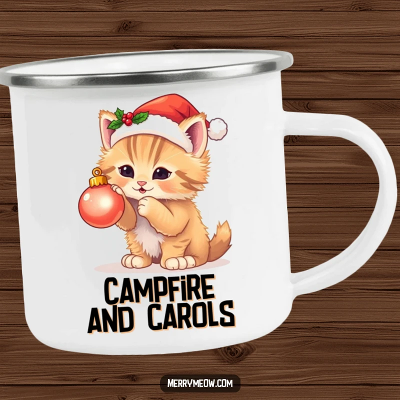 Funny camping mug featuring a fluffy kitten in a Santa hat batting at a twinkling ornament, ideal for holiday outdoor enjoyment.