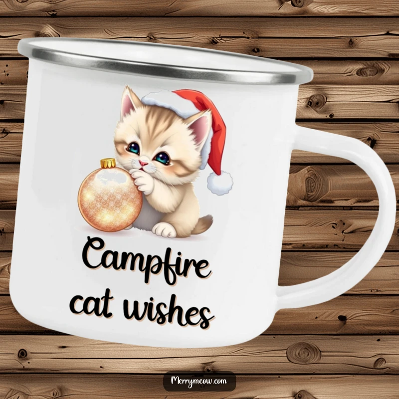 Funny Kitten Santa Hat Camping Mug: Durable mug with a fluffy kitten in a Santa hat playfully batting at a shimmering ornament, for outdoor holidays.