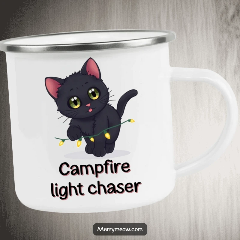 Funny camping mug with a black kitten pouncing on twinkling lights, perfect for outdoor adventures and hot drinks.