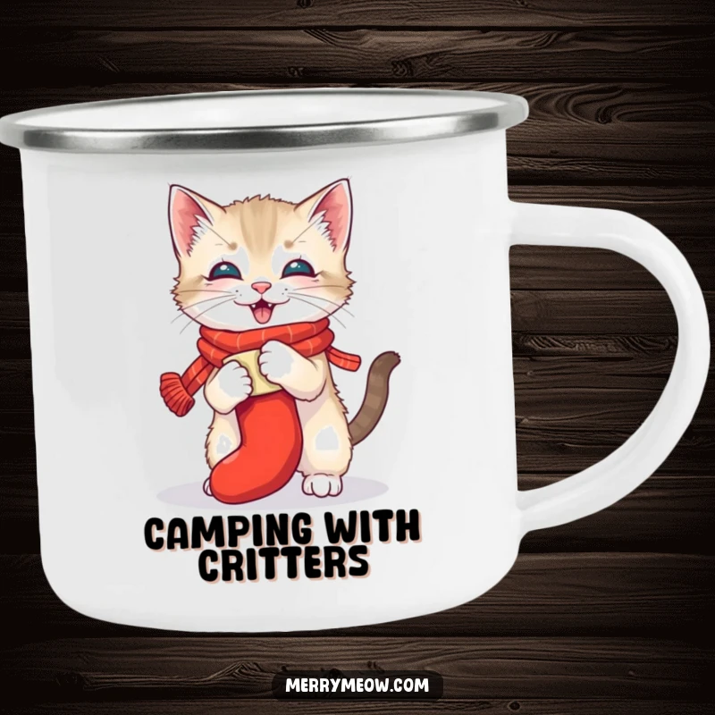 Funny enamel camping mug with a playful kitten wrestling a stocking, great for outdoor trips and enjoying beverages with holiday humor, a gift.