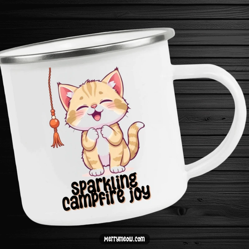 Funny kitten camping mug, gleefully batting at shiny tinsel, perfect for adding festive cheer and playful energy to outdoor drinks.