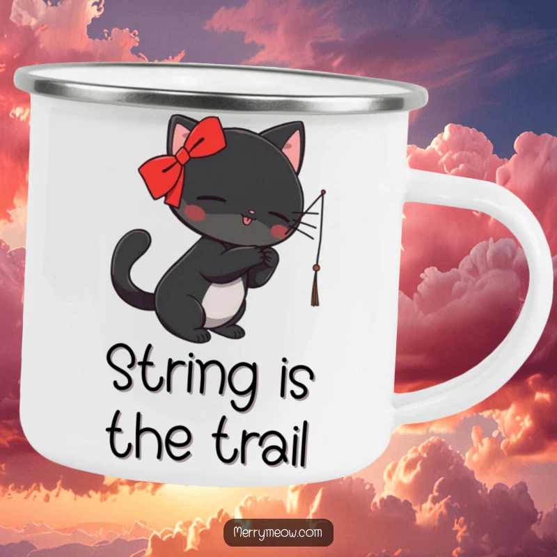 Funny Camping Mug: A black cat with a red ribbon playfully bats at a dangling string, adding hilarious fun to outdoor brews.