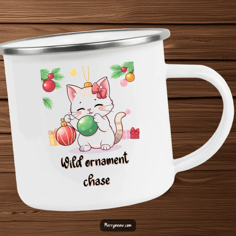Funny cat playfully batting a Christmas ornament, humorously depicted on a durable camping mug.
