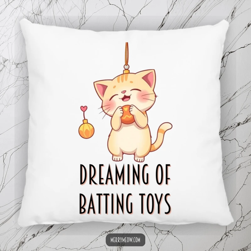 Funny pillow with a playful cat batting at a shiny Christmas ornament, offering plush comfort and festive feline charm.