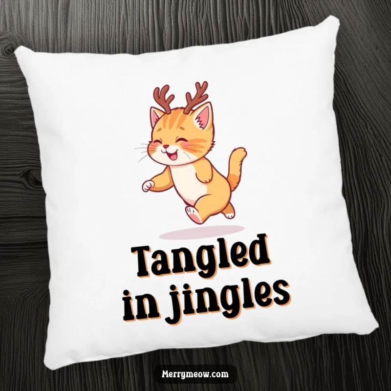 Funny pillow showcasing a cute ginger kitten wearing reindeer antlers, joyfully spinning after its tail.
