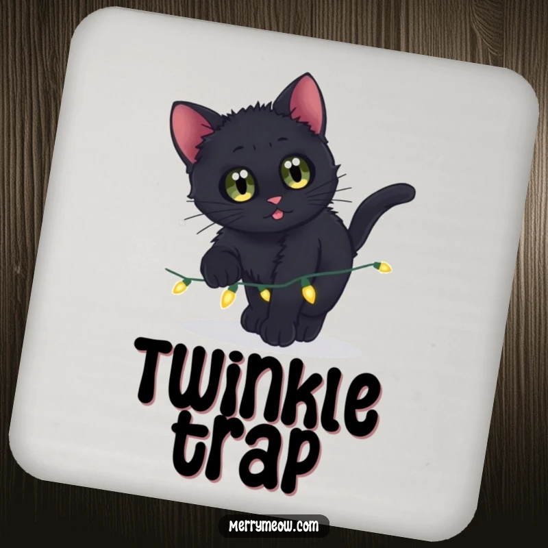 Funny drink coaster with a black kitten playfully pouncing on a string of twinkling lights.
