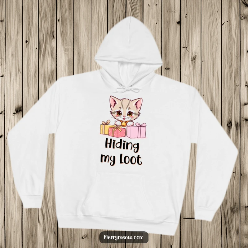 Funny hoodie featuring a mischievous kitten hiding behind wrapped gifts, offering comfort and laughter for all.