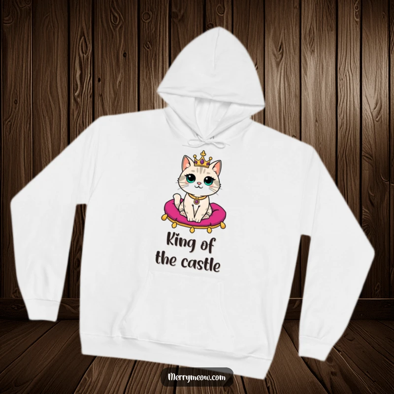Funny Hoodie: A majestic cat wearing a small crown is seated regally on a velvet cushion, a truly comical sight.
