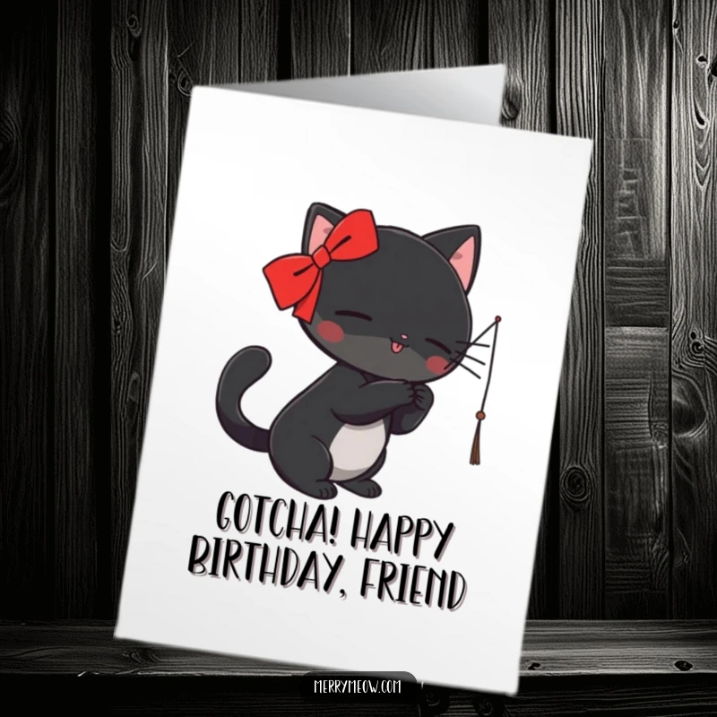Funny Free Printable Birthday Card: Black cat with red ribbon batting at string, capturing playful and energetic birthday wishes.