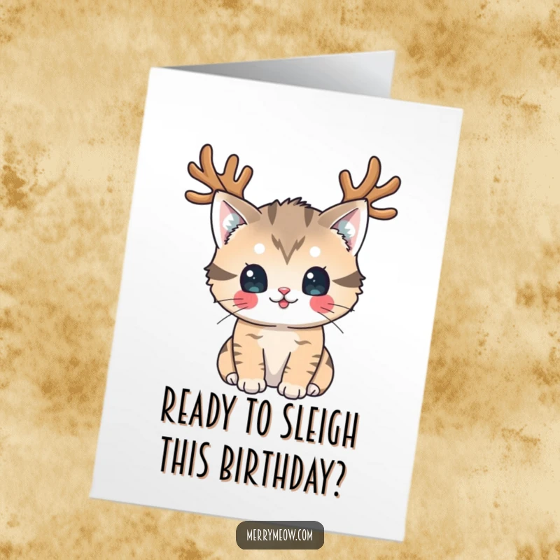 Funny Free Printable Birthday Card: Cat wearing reindeer antlers, looking playfully, perfect for a festive and humorous birthday wish.