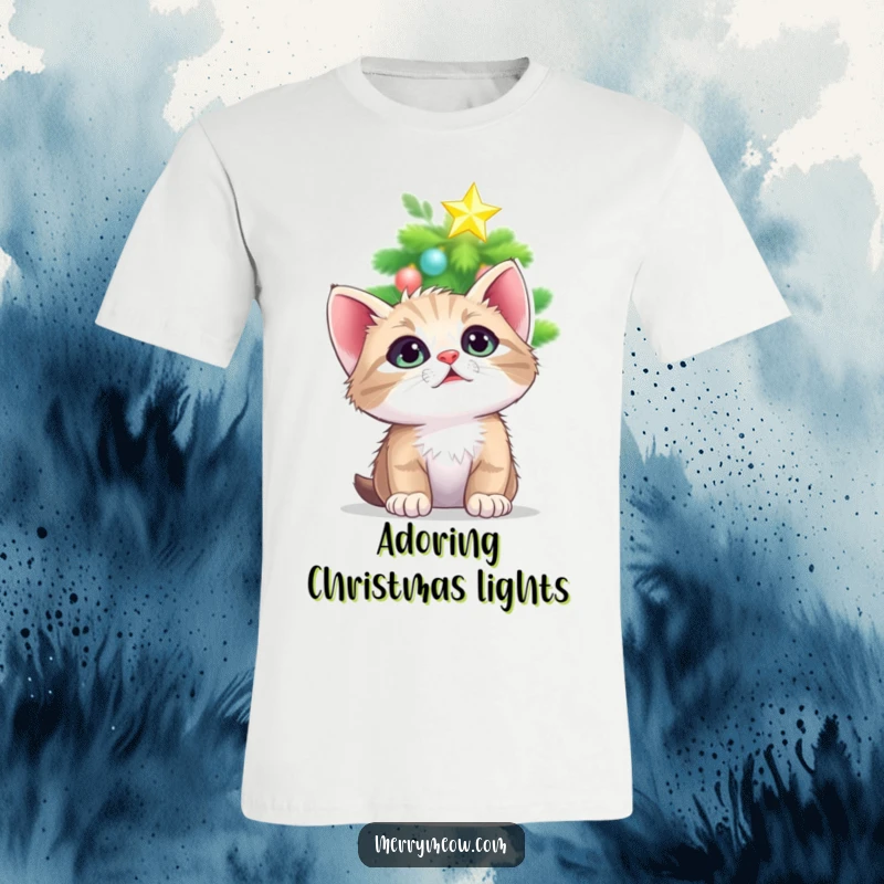 Funny t-shirt depicting a kitten looking up with wide, loving eyes at a luminous, twinkling Christmas tree star, full of festive adoration.