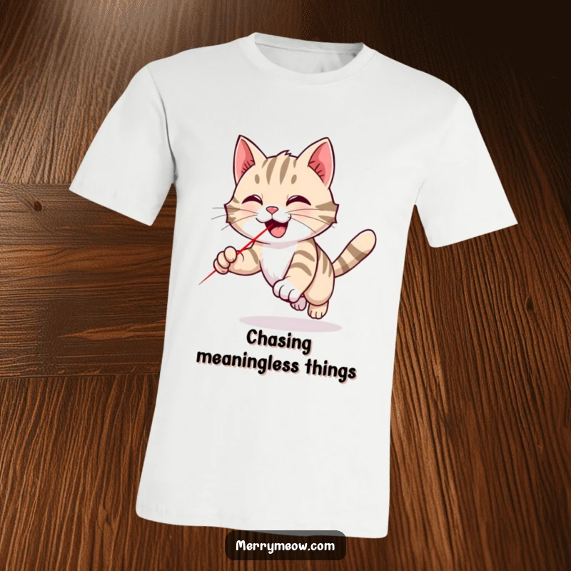 Funny tabby cat t-shirt featuring a dynamic illustration of a cat joyfully chasing a red laser pointer dot with energetic abandon.
