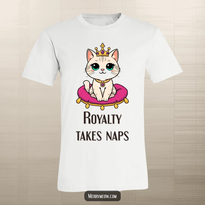 Funny T-Shirt: A sophisticated cat sporting a miniature crown sits regally upon a plush velvet cushion, looking hilariously dignified.