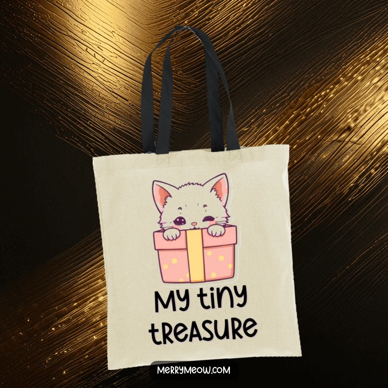 Funny tote bag with an adorable kitten peeking out of a gift box, ready to carry your items with charm.